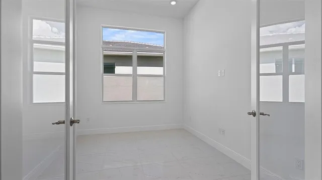 a view of an empty room with window