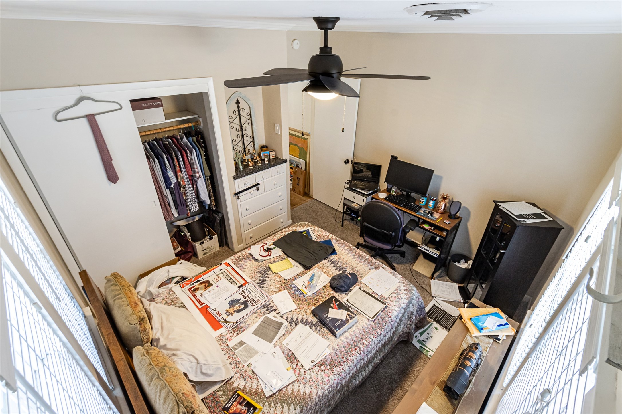 606 Enid Street, Unit 3 Houston, TX 77009 - Photo 12 of 42 a bed sitting in a bedroom next to a window