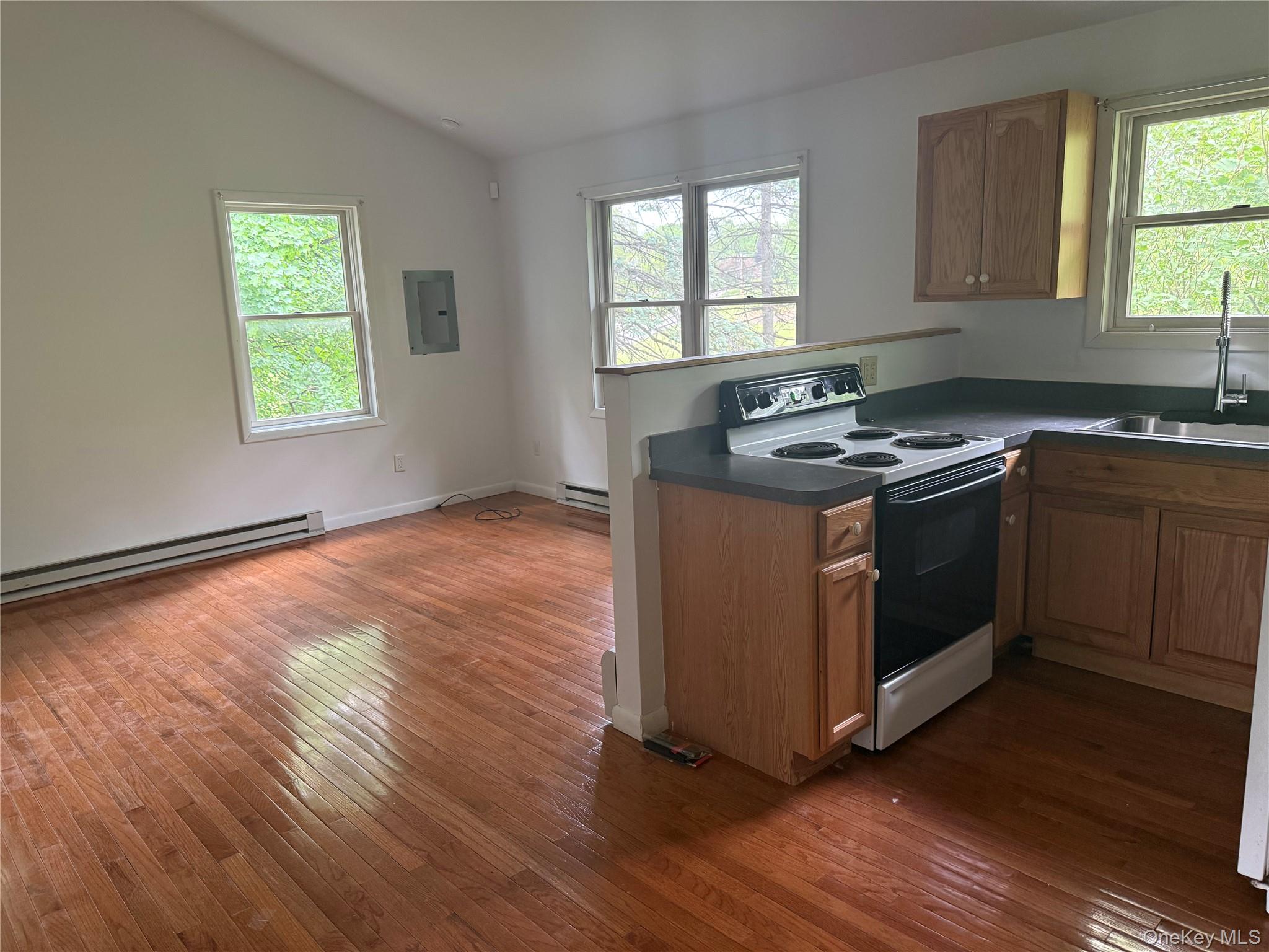 183 Barrytown Road Barrytown, NY 12507 - Photo 21 of 41 a kitchen with a stove and wooden floor