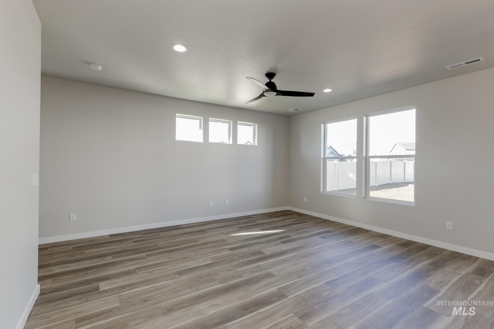 10574 West Teratai Street Star, ID 83669 - Photo 10 of 23 Spare room with recessed lighting, light wood-style floors, and ceiling fan