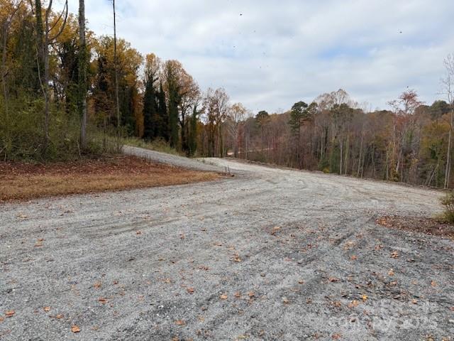 0 Oakland Road Spindale, NC 28160 - Photo 3 of 20 a view of dirt field with trees in the background