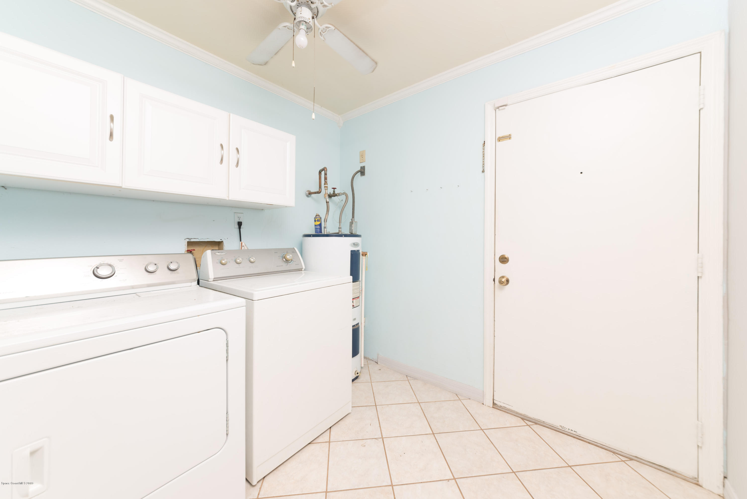 5660 Banos Avenue Cocoa, FL 32927 - Photo 17 of 22 a utility room with dryer and washer