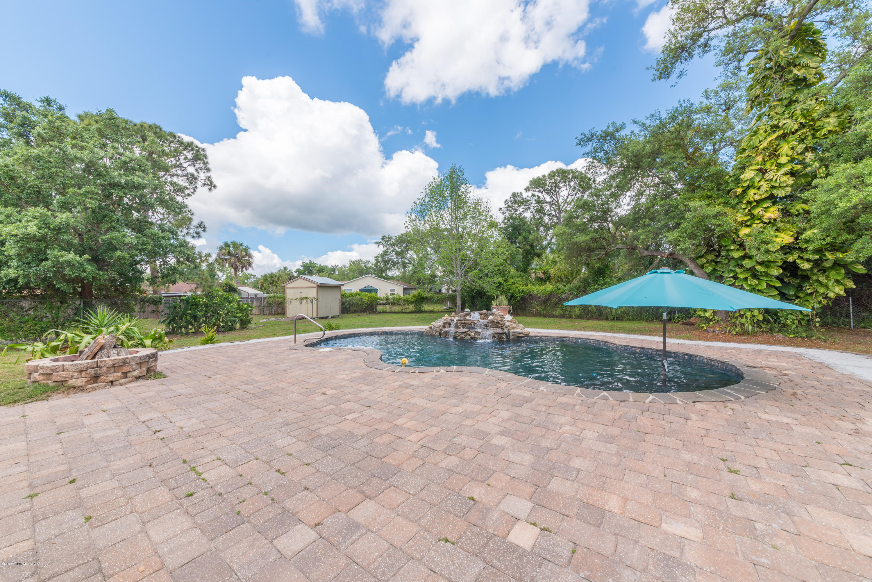 5660 Banos Avenue Cocoa, FL 32927 - Photo 21 of 22 a view of a backyard