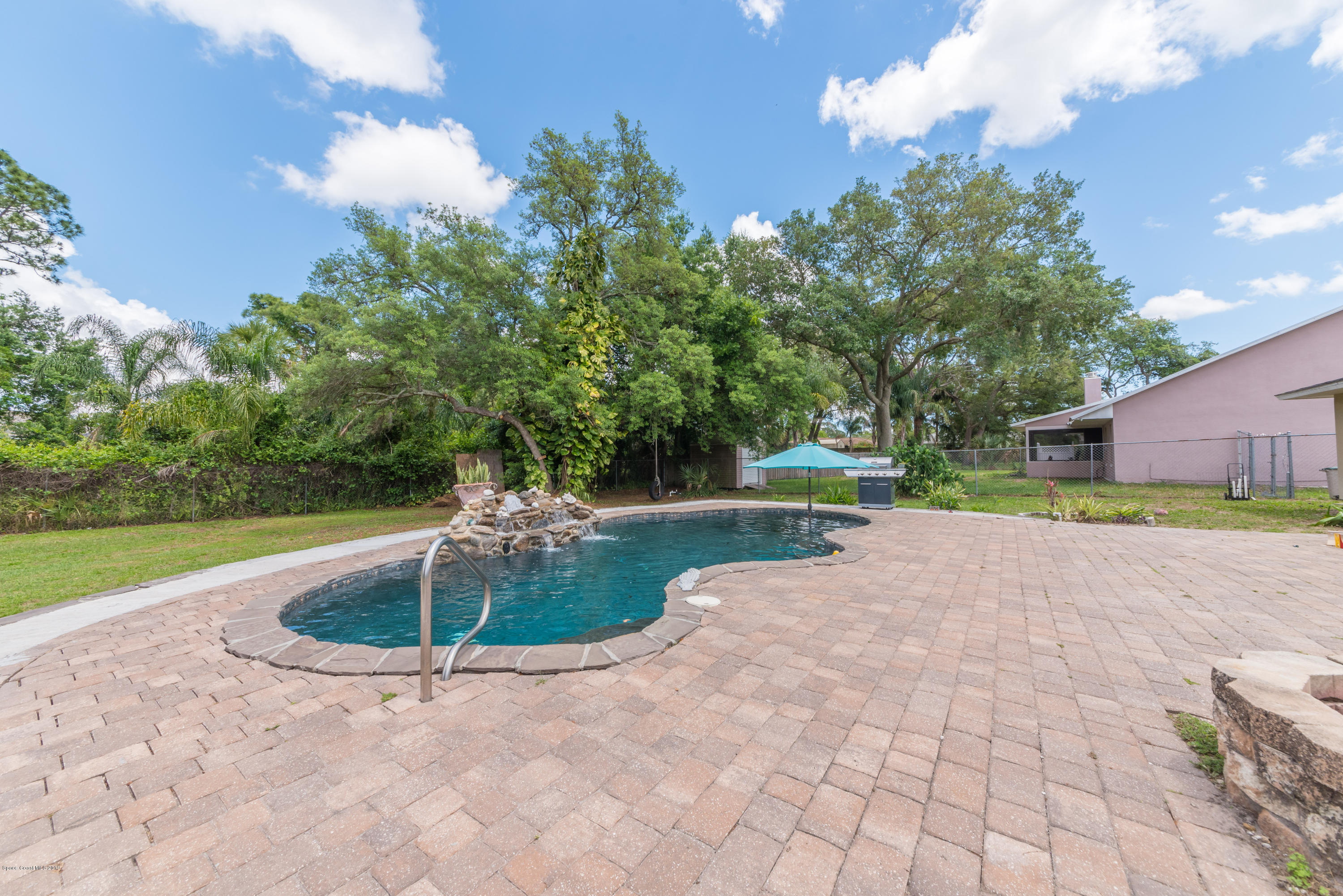 5660 Banos Avenue Cocoa, FL 32927 - Photo 22 of 22 a view of a fountain with a yard