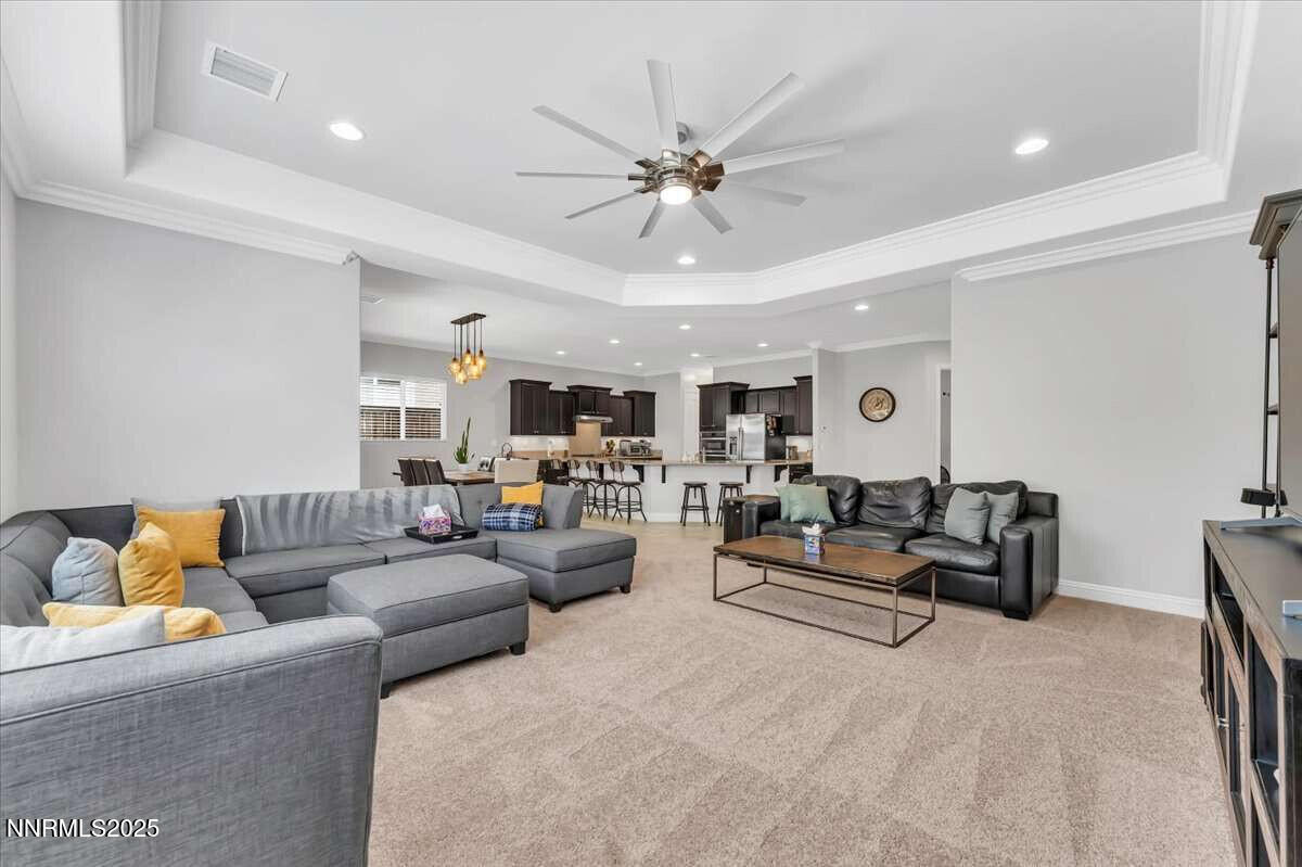 1671 Crescent Pointe Court Reno, NV 89523 - Photo 11 of 44 a living room with furniture and a large window