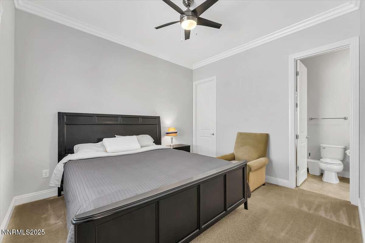 1671 Crescent Pointe Court Reno, NV 89523 - Photo 23 of 44 a bed room with a bed and a ceiling fan