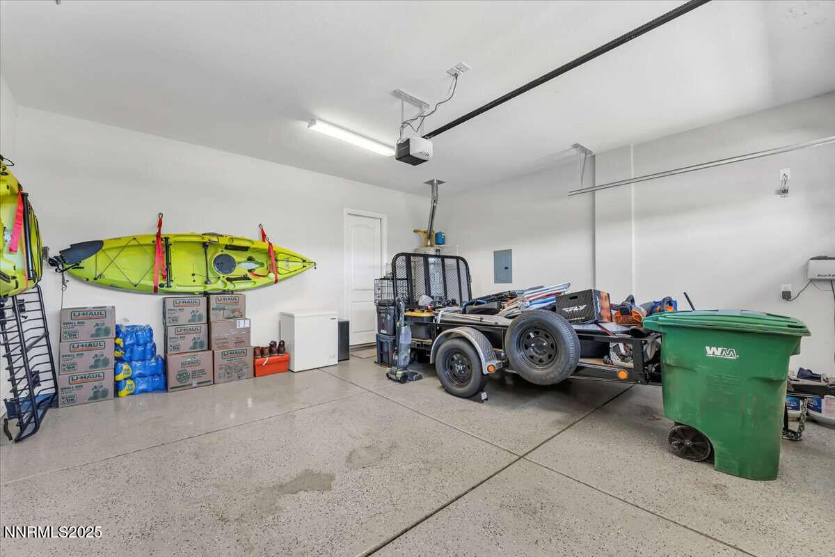 1671 Crescent Pointe Court Reno, NV 89523 - Photo 29 of 44 a view of a garage with furniture