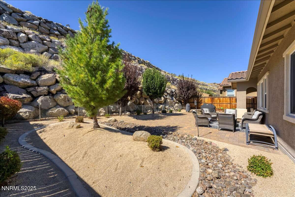 1671 Crescent Pointe Court Reno, NV 89523 - Photo 36 of 44 a view of a swimming pool with a patio