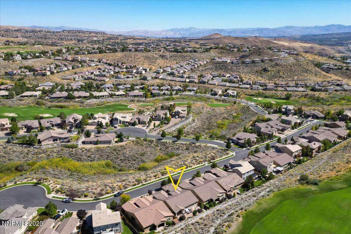 1671 Crescent Pointe Court Reno, NV 89523 - Photo 41 of 44 an aerial view of a city with lots of residential buildings