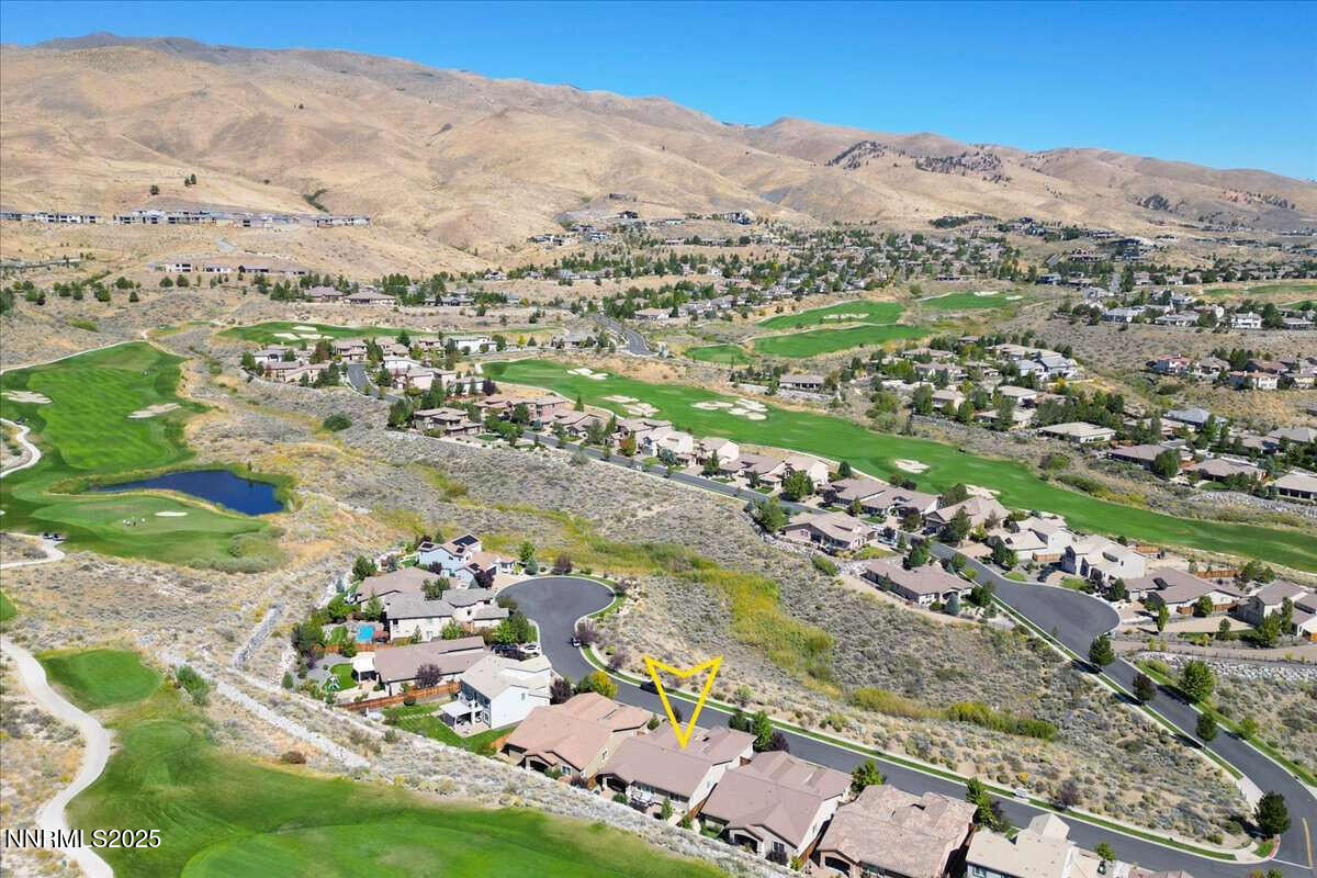 1671 Crescent Pointe Court Reno, NV 89523 - Photo 42 of 44 an aerial view of residential houses with outdoor space