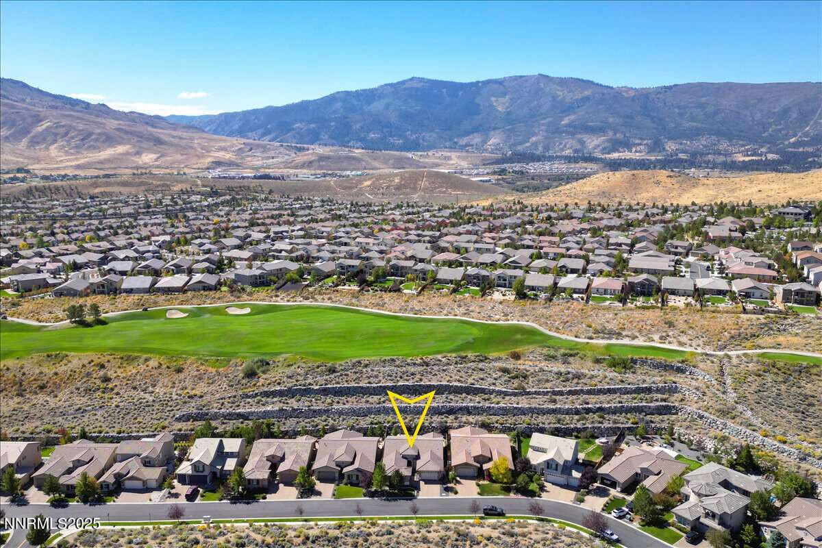 1671 Crescent Pointe Court Reno, NV 89523 - Photo 43 of 44 a view of a city with a mountain