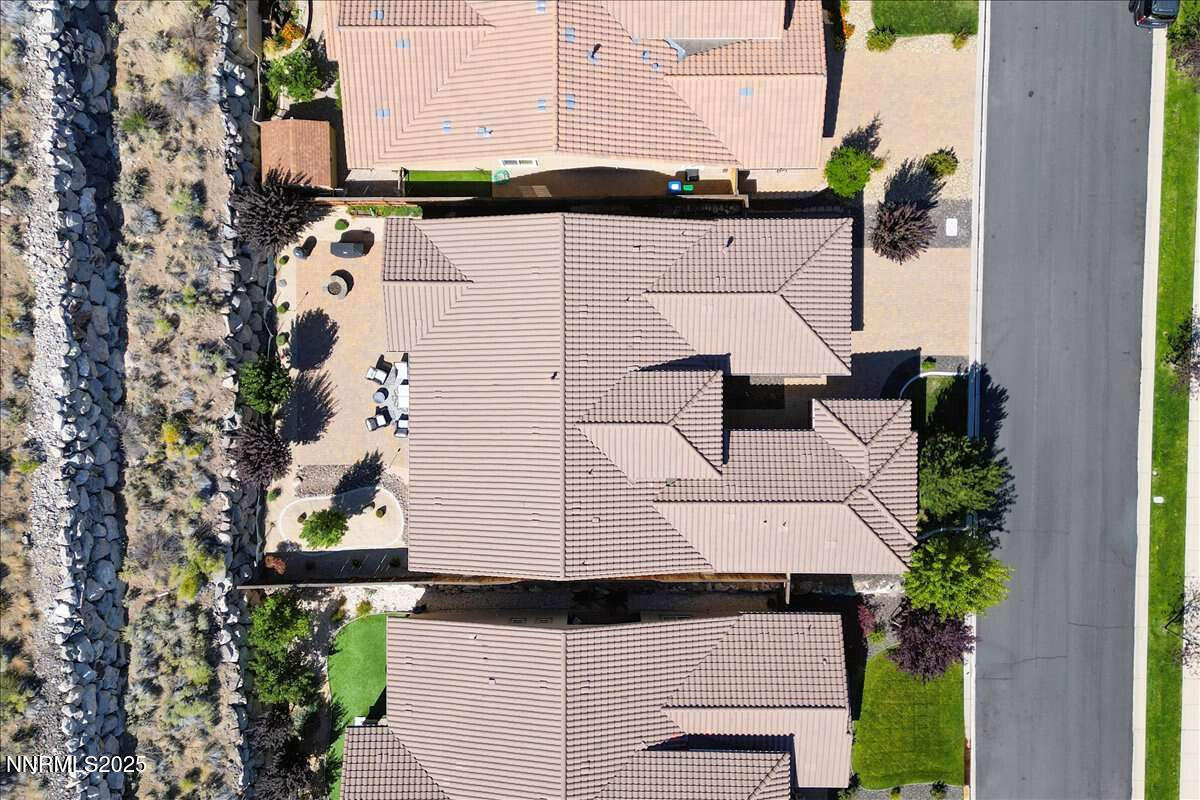 1671 Crescent Pointe Court Reno, NV 89523 - Photo 44 of 44 an aerial view of multiple houses with yard