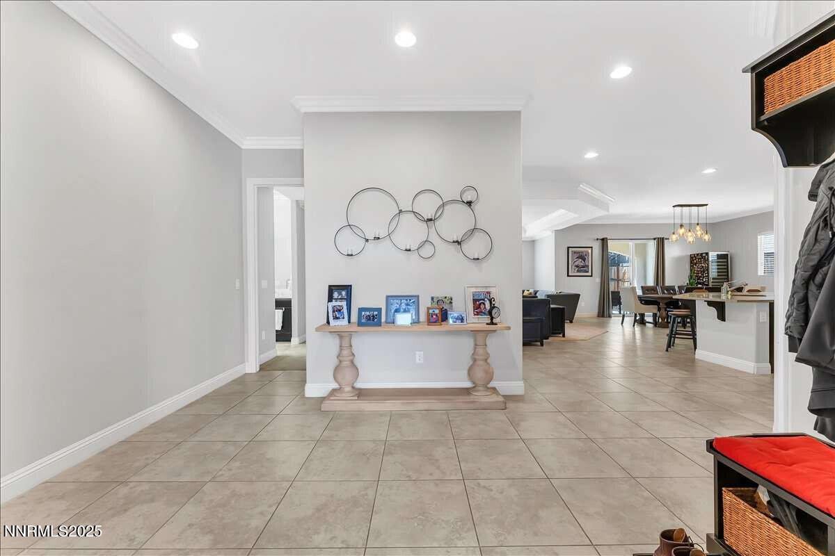 1671 Crescent Pointe Court Reno, NV 89523 - Photo 5 of 44 a view of living room with furniture and kitchen view
