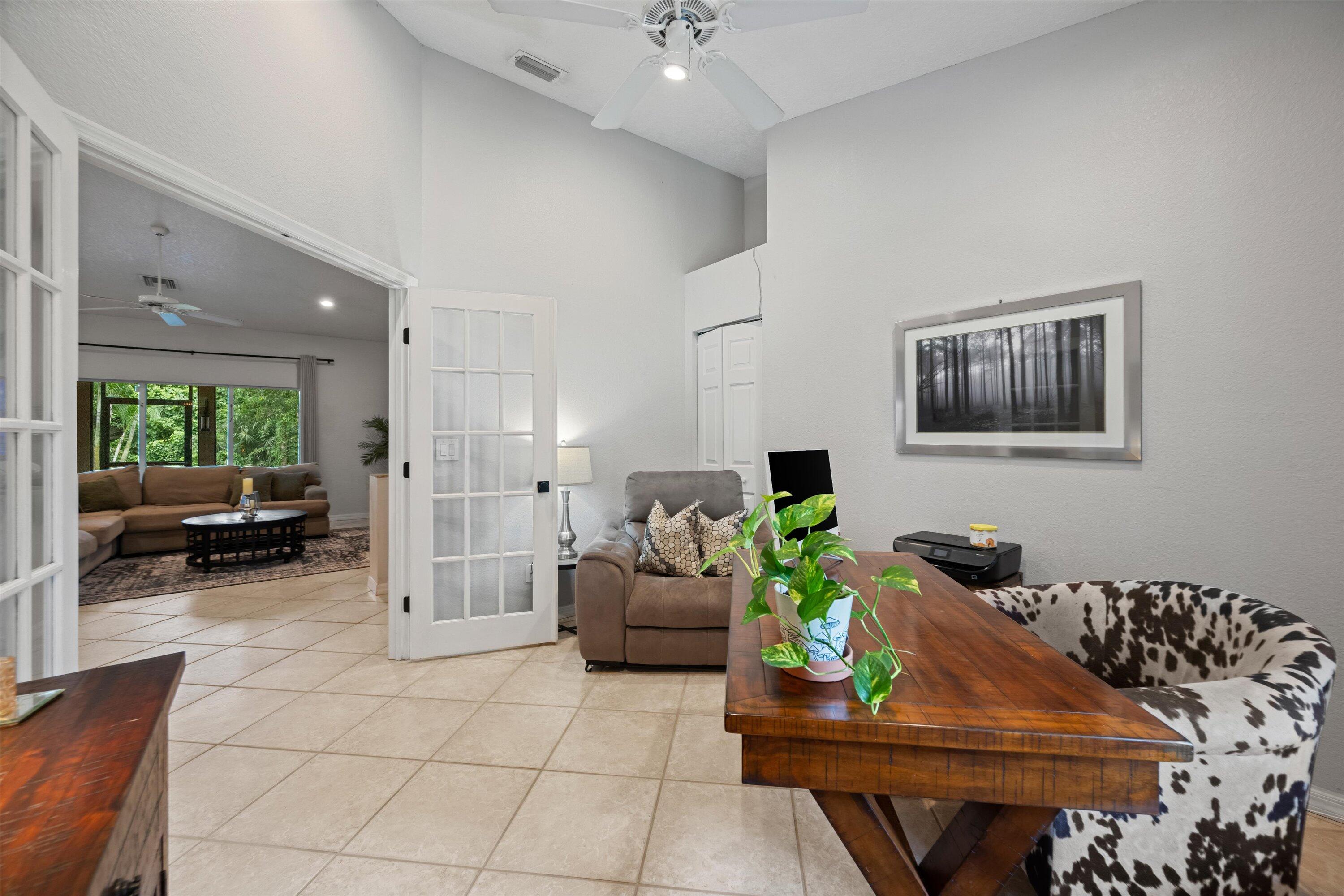 10771 154th Road North Jupiter, FL 33478 - Photo 29 of 87 a living room with furniture and a couch