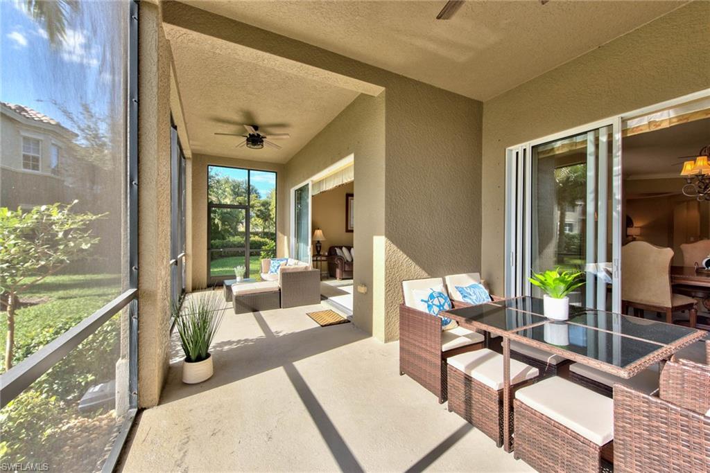 Undisclosed Address Naples, FL 34114 - Photo 19 of 25 a living room with furniture