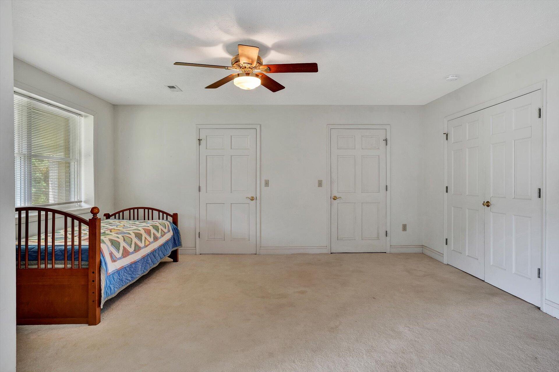 2446 Deer Run Road Ferrum, VA 24088 - Photo 99 of 145 a view of room with chandelier fan and windows