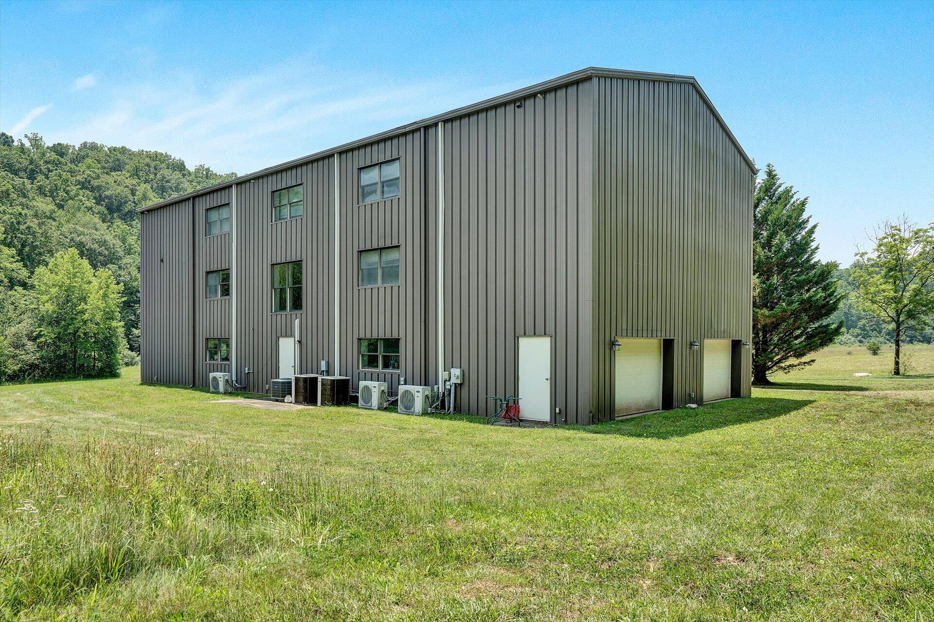 2446 Deer Run Road Ferrum, VA 24088 - Photo 108 of 145 a view of a house with backyard and trees