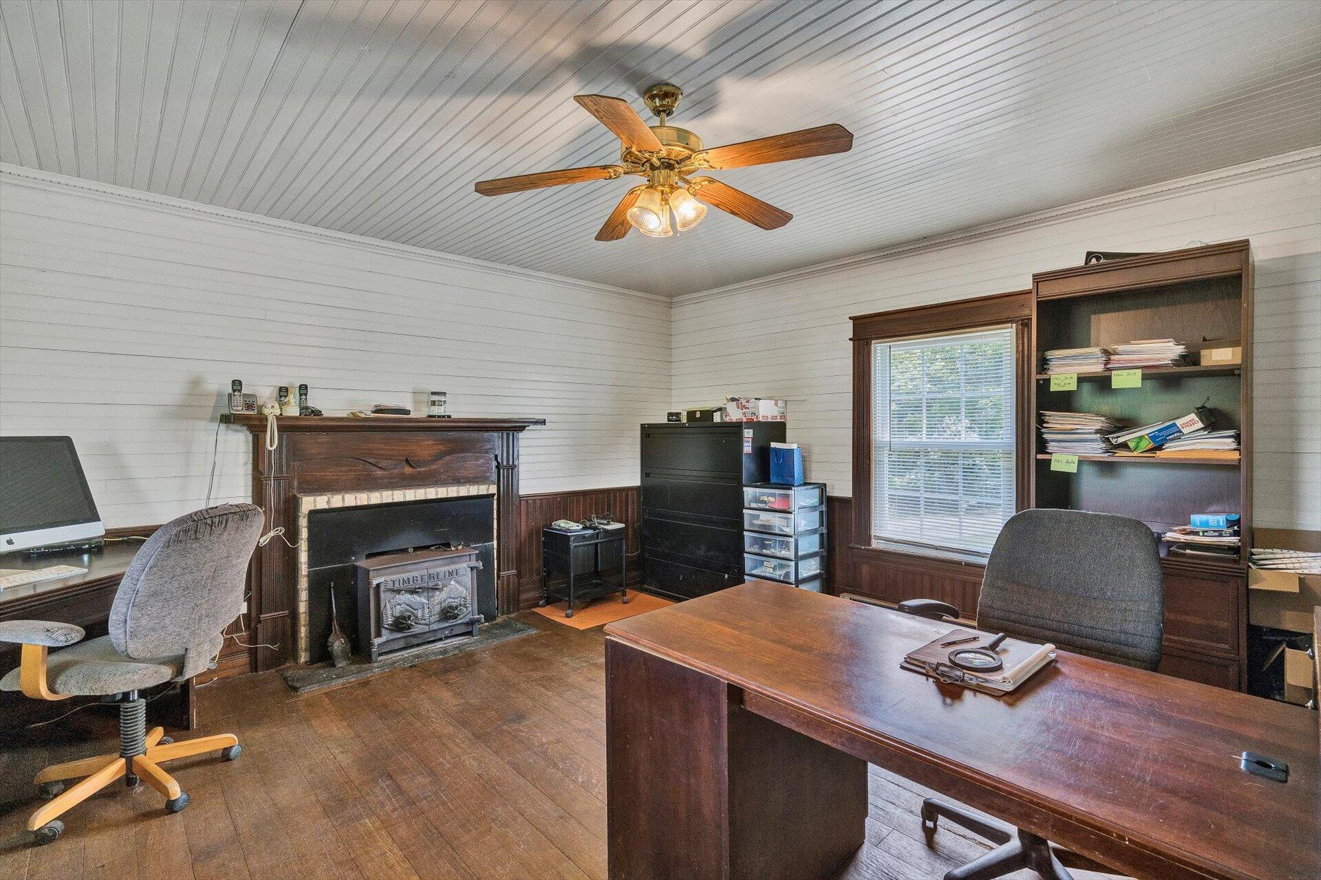 2446 Deer Run Road Ferrum, VA 24088 - Photo 34 of 145 a work room with furniture and a flat screen tv