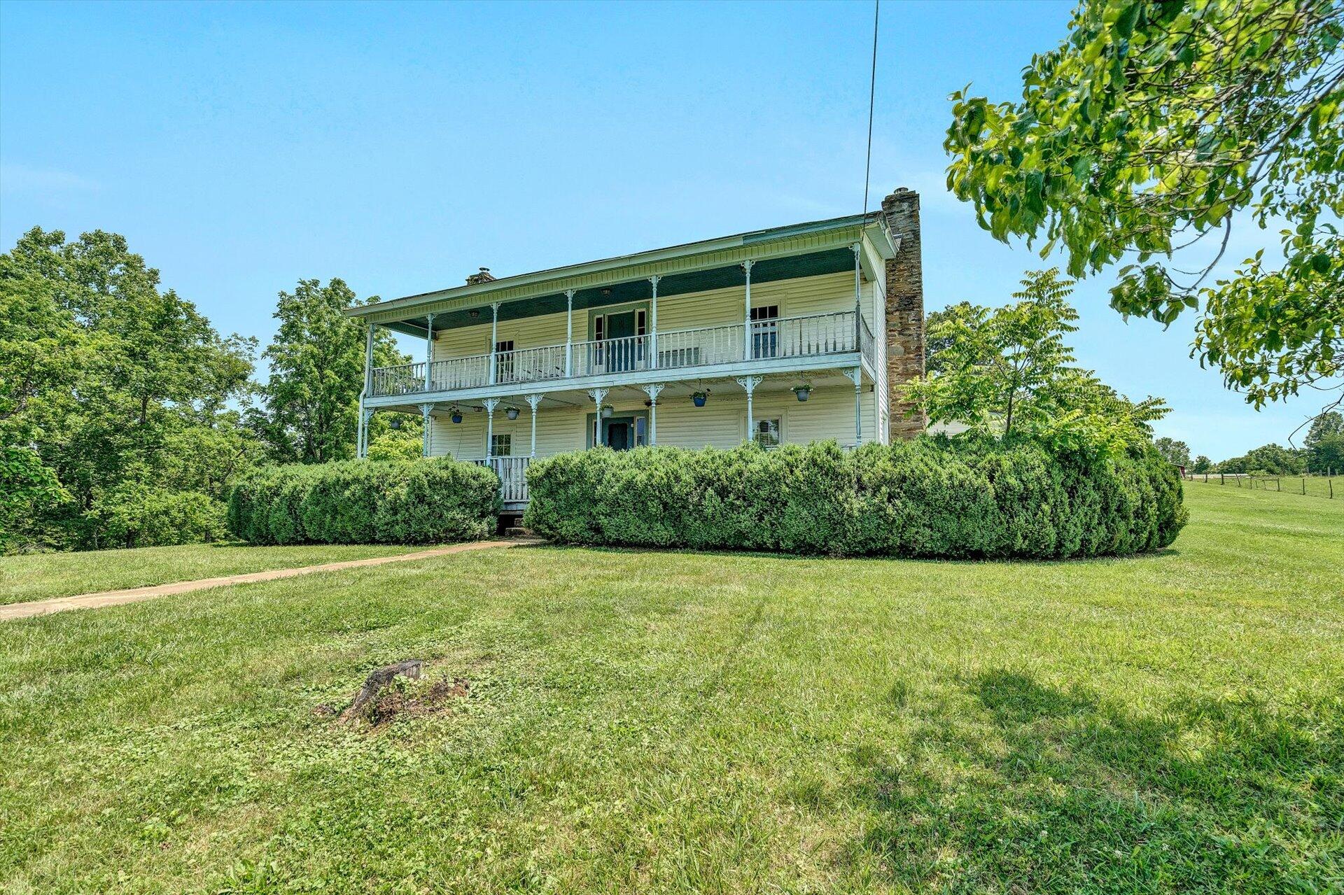 2446 Deer Run Road Ferrum, VA 24088 - Photo 44 of 145 a view of a large building with a big yard