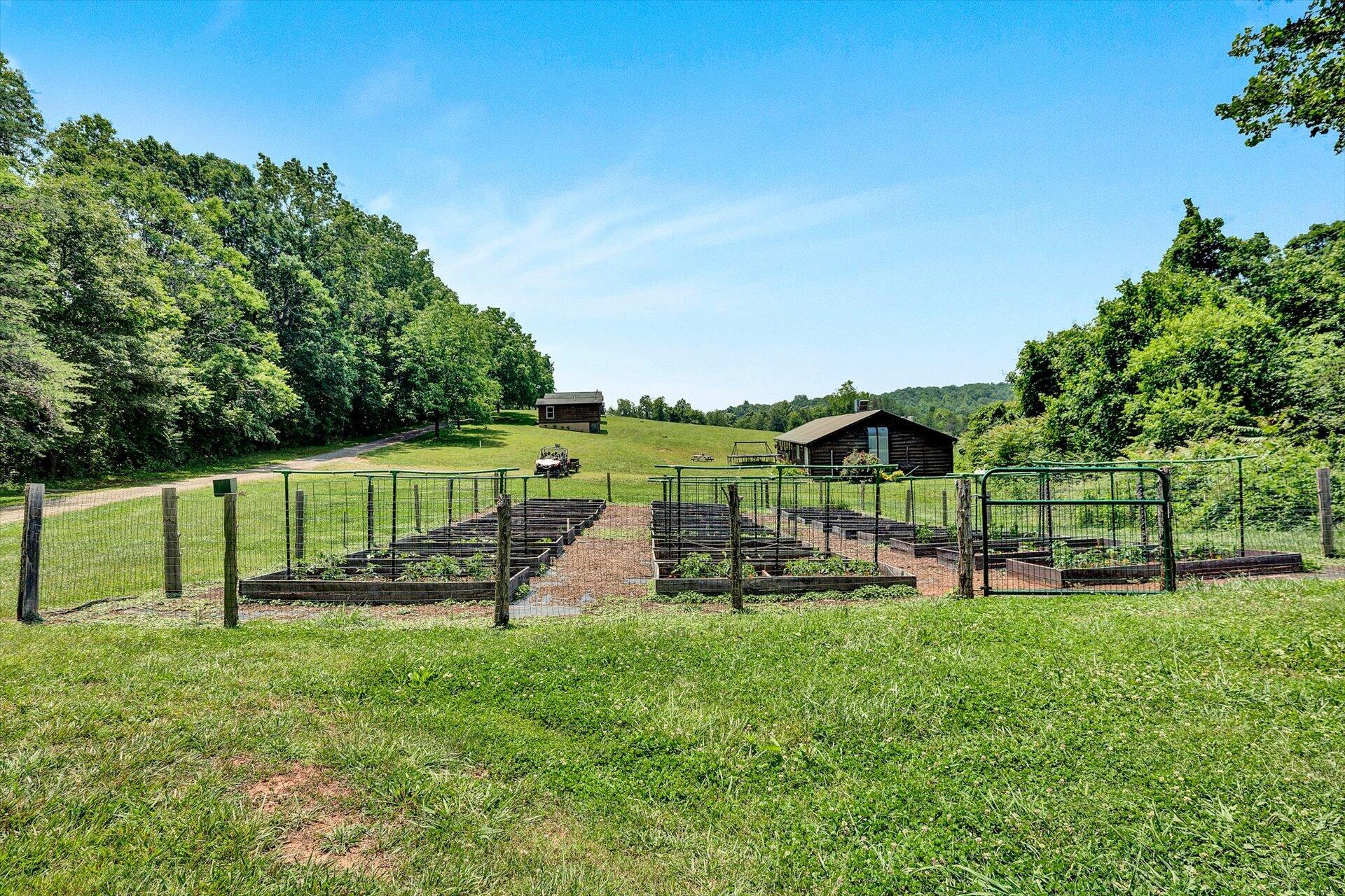 2446 Deer Run Road Ferrum, VA 24088 - Photo 58 of 145 a view of a park with swings