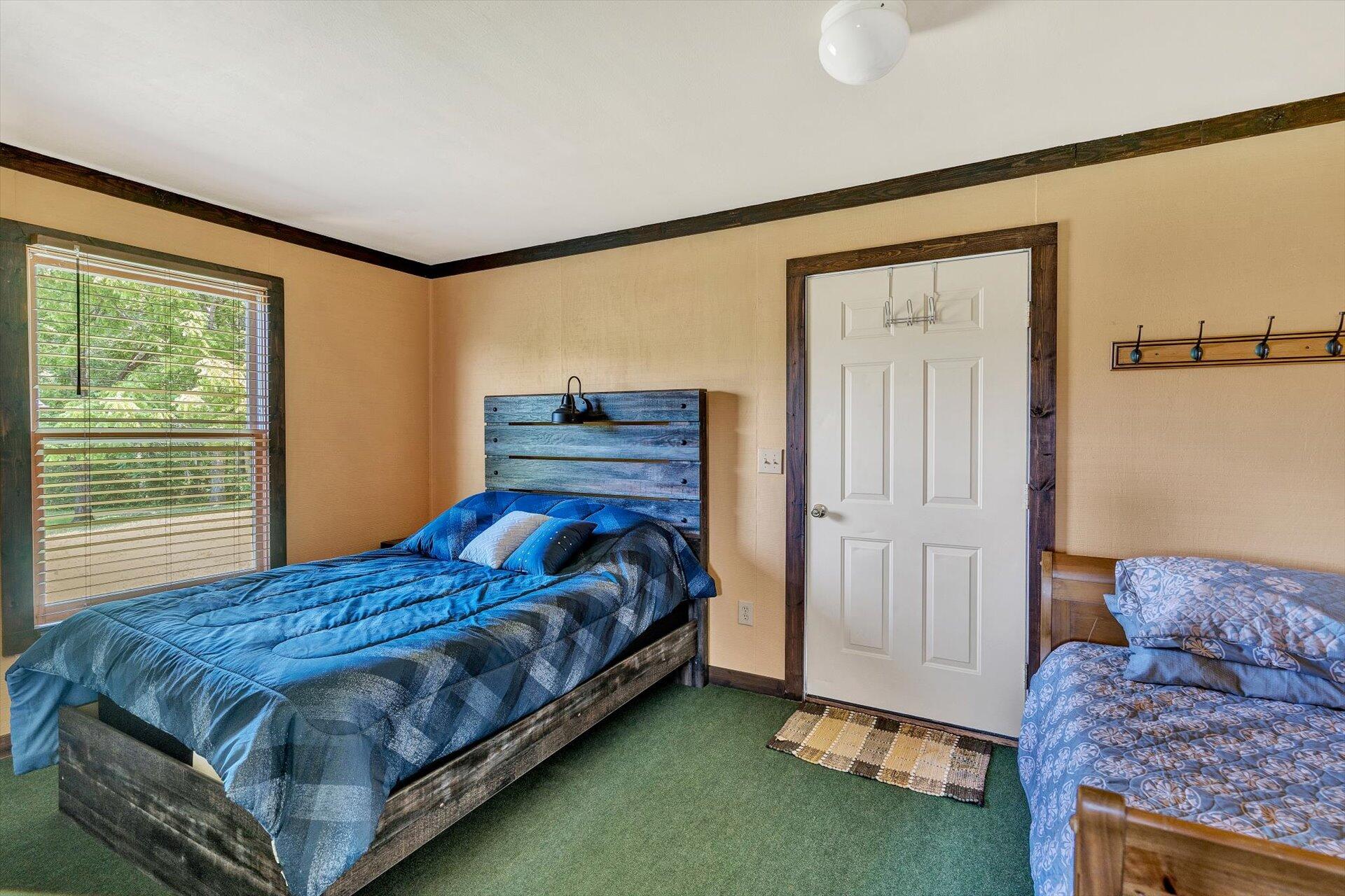 2446 Deer Run Road Ferrum, VA 24088 - Photo 68 of 145 a bedroom with a bed and a window with the outer view