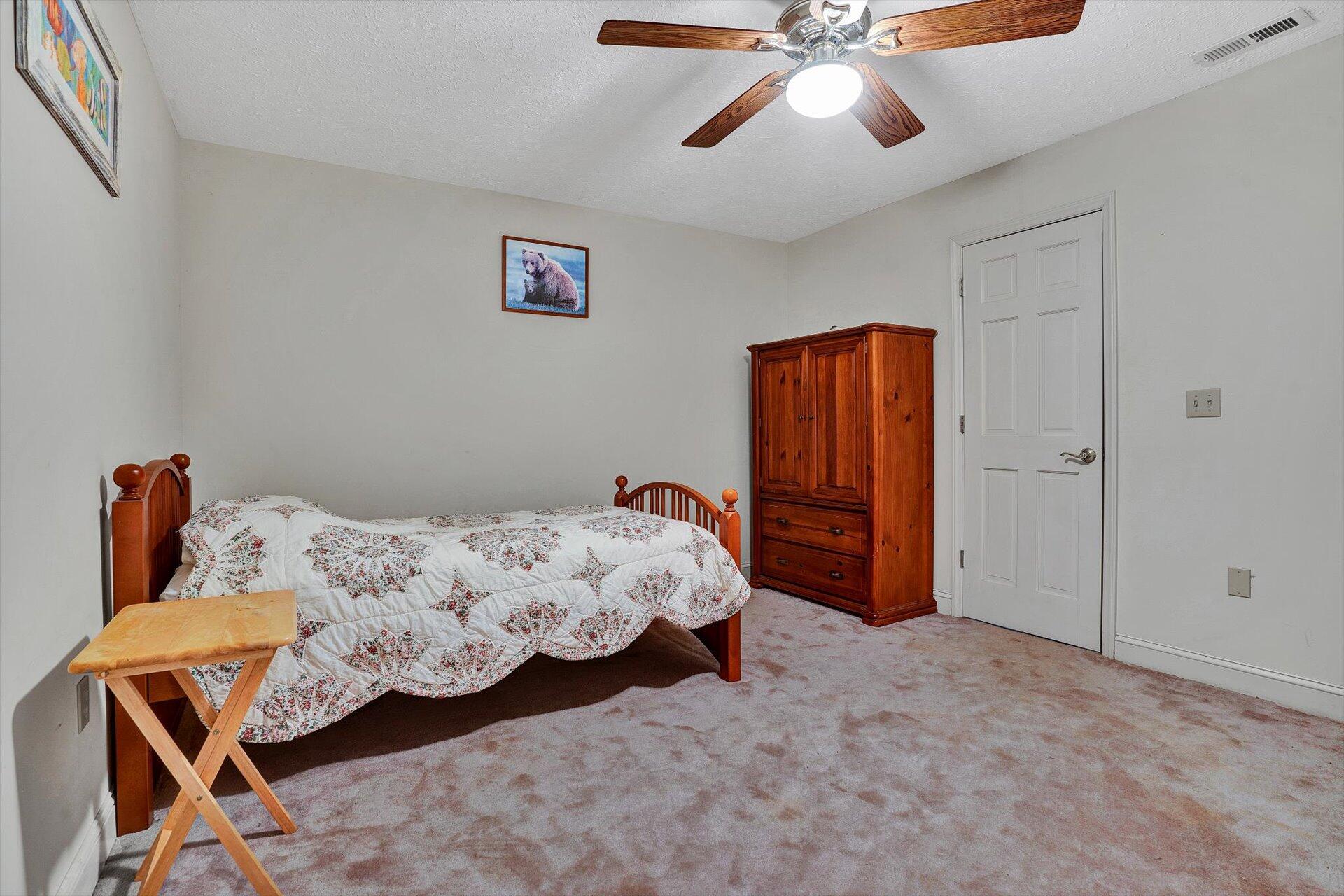 2446 Deer Run Road Ferrum, VA 24088 - Photo 82 of 145 a bedroom with bed and window