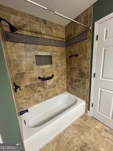 a bathroom with a bathtub