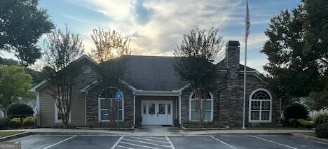 a view of a building with a tree