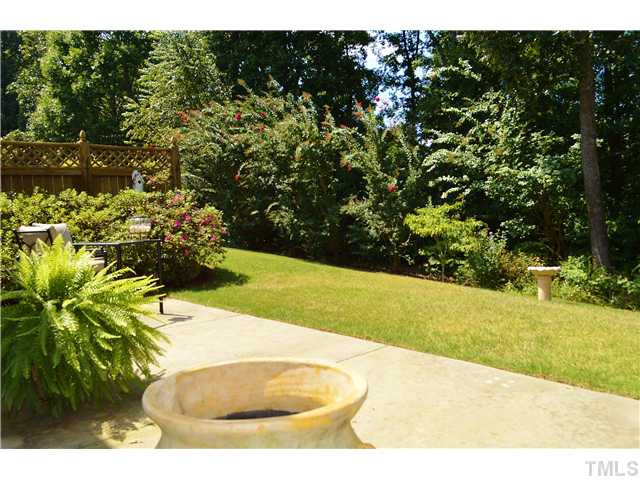 3723 Old Post Road Raleigh, NC 27612 - Photo 22 of 25 Another view from the patio. The common area is very deep and provides great privacy. Yard