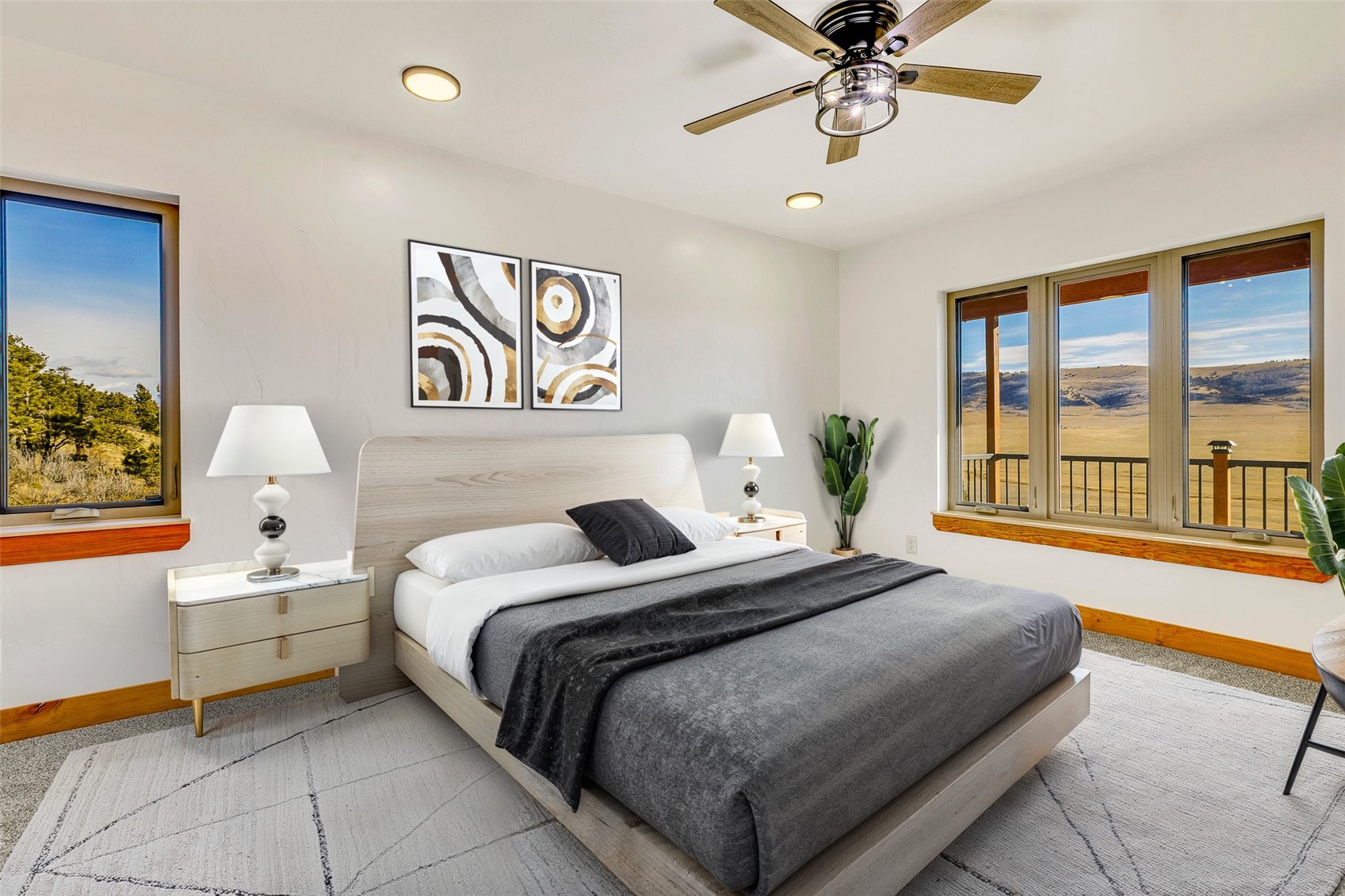 3415 Redhill Road Fairplay, CO 80440 - Photo 5 of 50 a bedroom with a bed and a chandelier