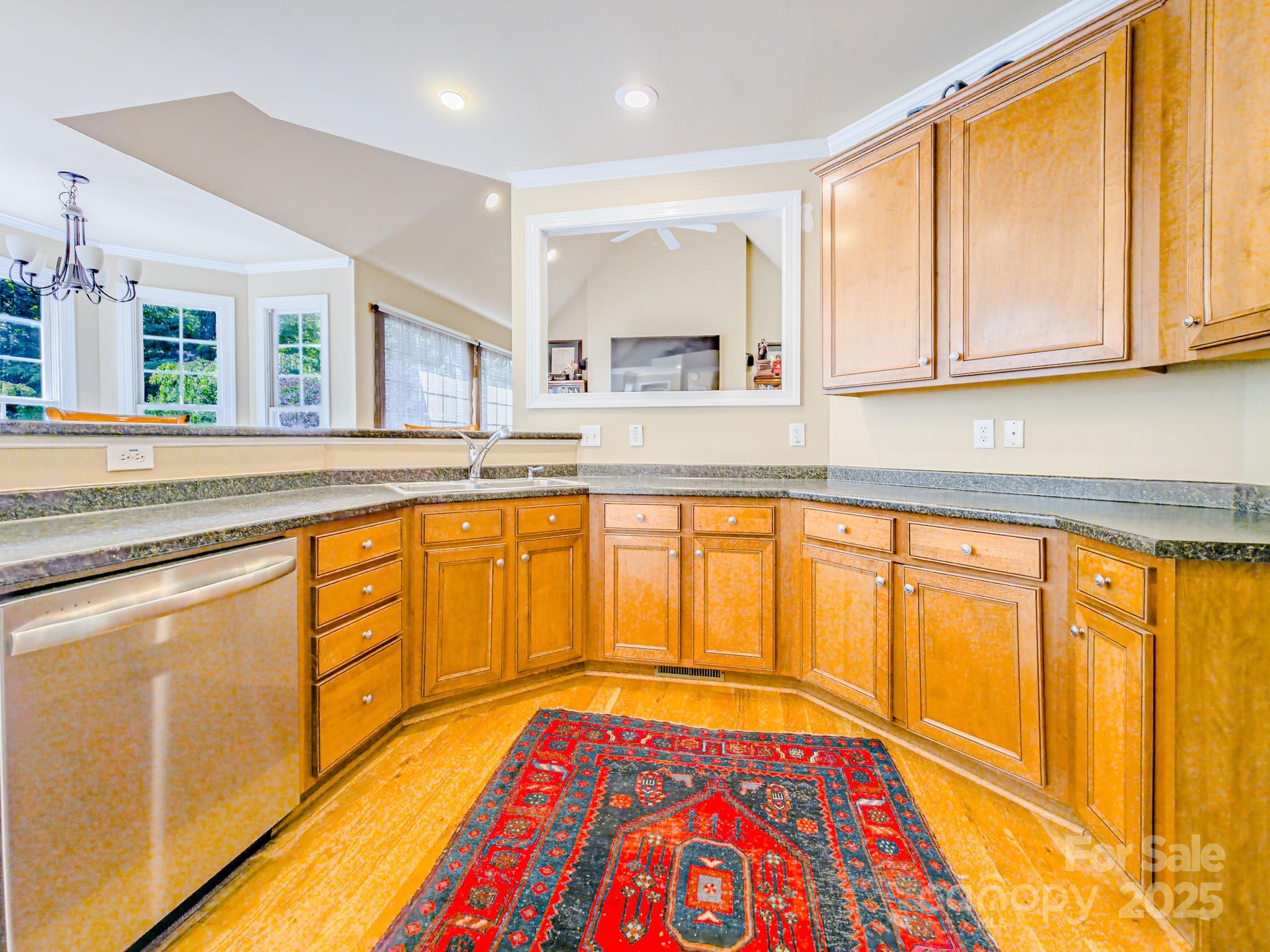 196 Col Hamptons Court Rutherfordton, NC 28139 - Photo 14 of 47 a view of a kitchen with wooden floor and cabinets