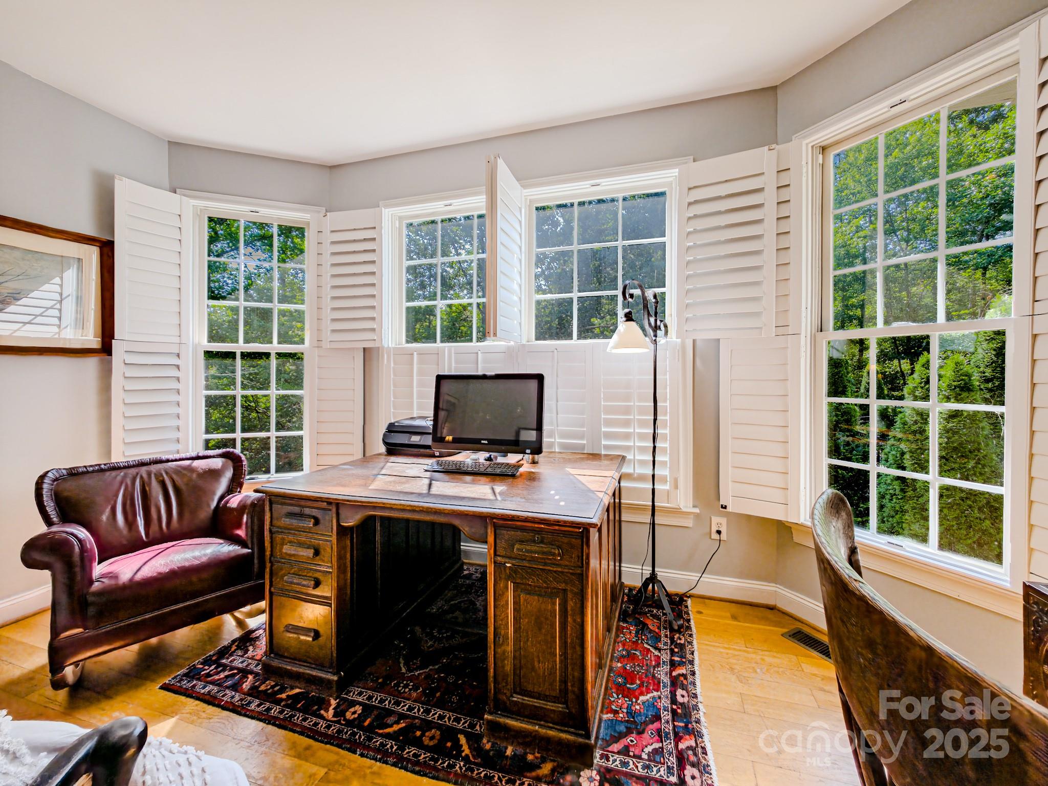 196 Col Hamptons Court Rutherfordton, NC 28139 - Photo 17 of 47 a view of a workspace with furniture and a window