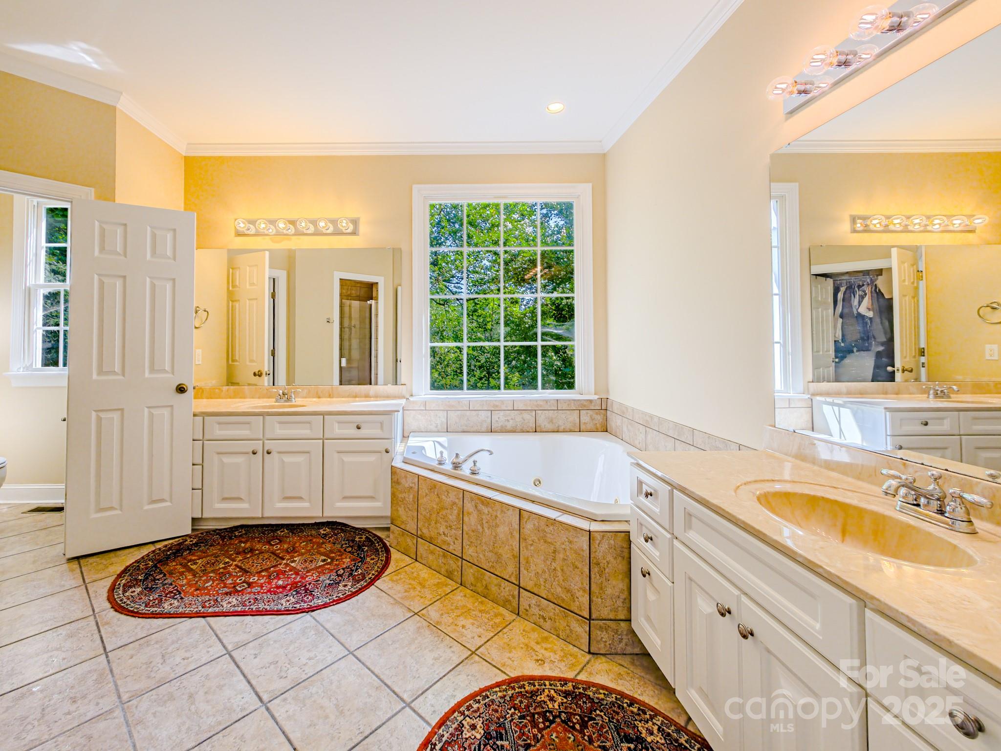 196 Col Hamptons Court Rutherfordton, NC 28139 - Photo 18 of 47 a bathroom with a granite countertop sink and a bathtub