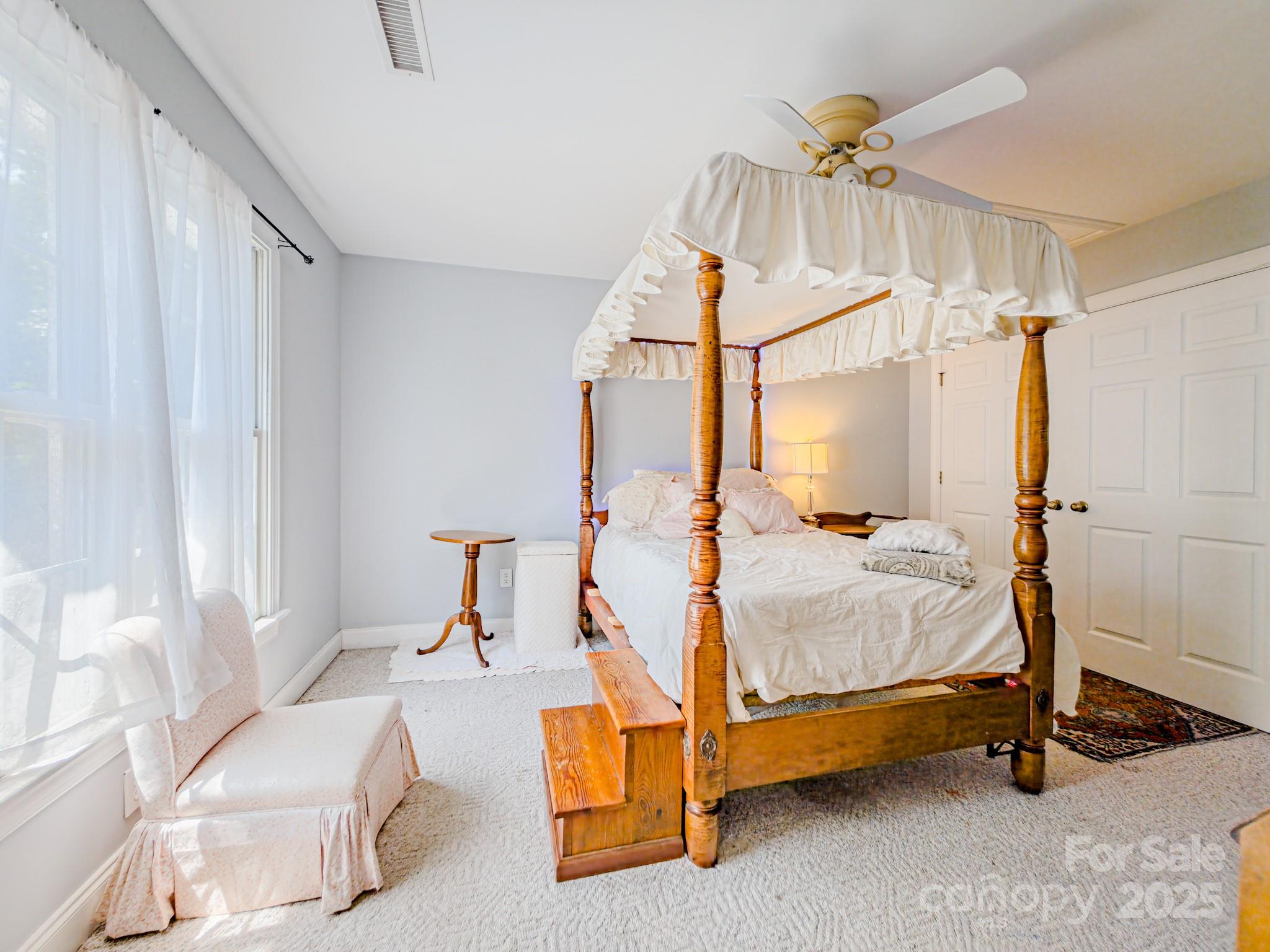 196 Col Hamptons Court Rutherfordton, NC 28139 - Photo 24 of 47 a bedroom with a bed and a window