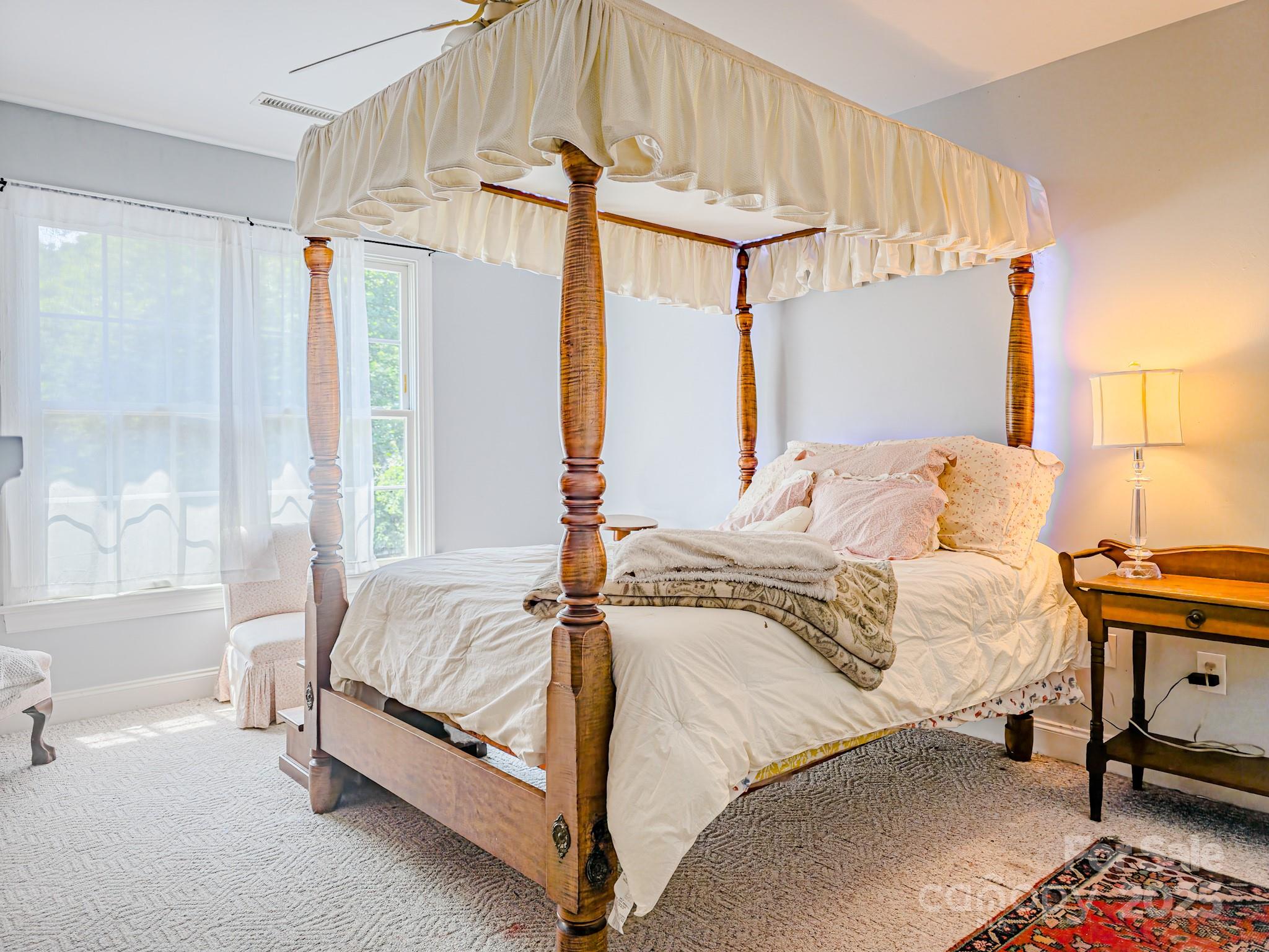 196 Col Hamptons Court Rutherfordton, NC 28139 - Photo 25 of 47 a bedroom with a bed and a window