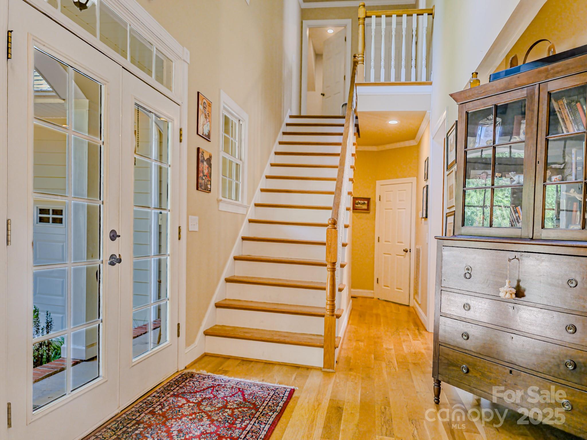 196 Col Hamptons Court Rutherfordton, NC 28139 - Photo 3 of 47 a view of an entryway with wooden floor and staircase