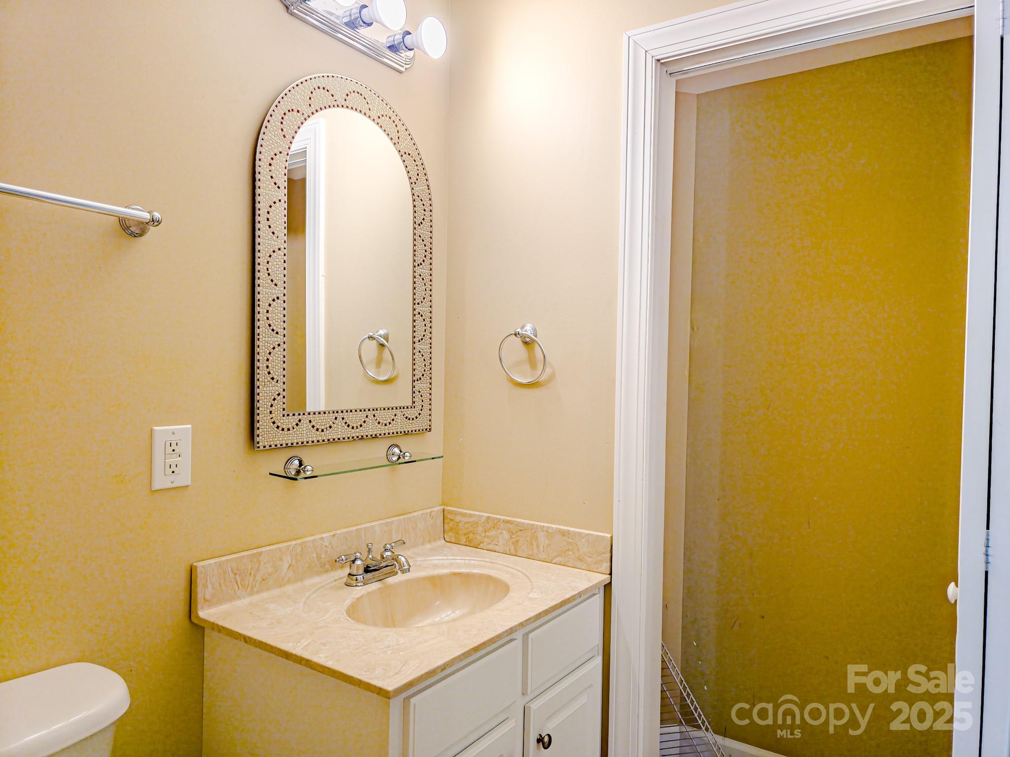 196 Col Hamptons Court Rutherfordton, NC 28139 - Photo 36 of 47 a bathroom with a sink and a mirror