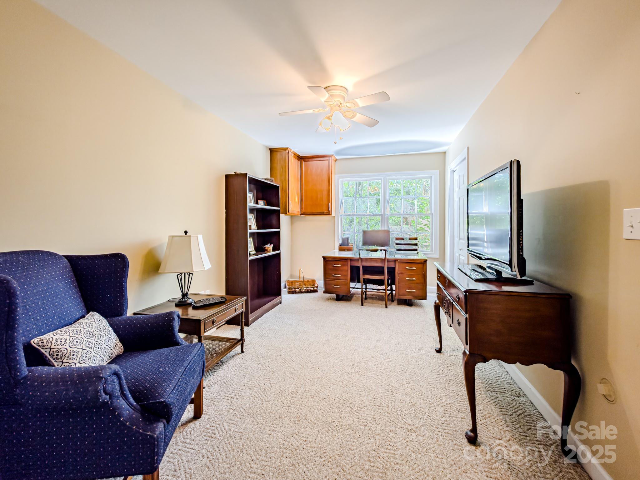 196 Col Hamptons Court Rutherfordton, NC 28139 - Photo 37 of 47 a living room with furniture and a flat screen tv