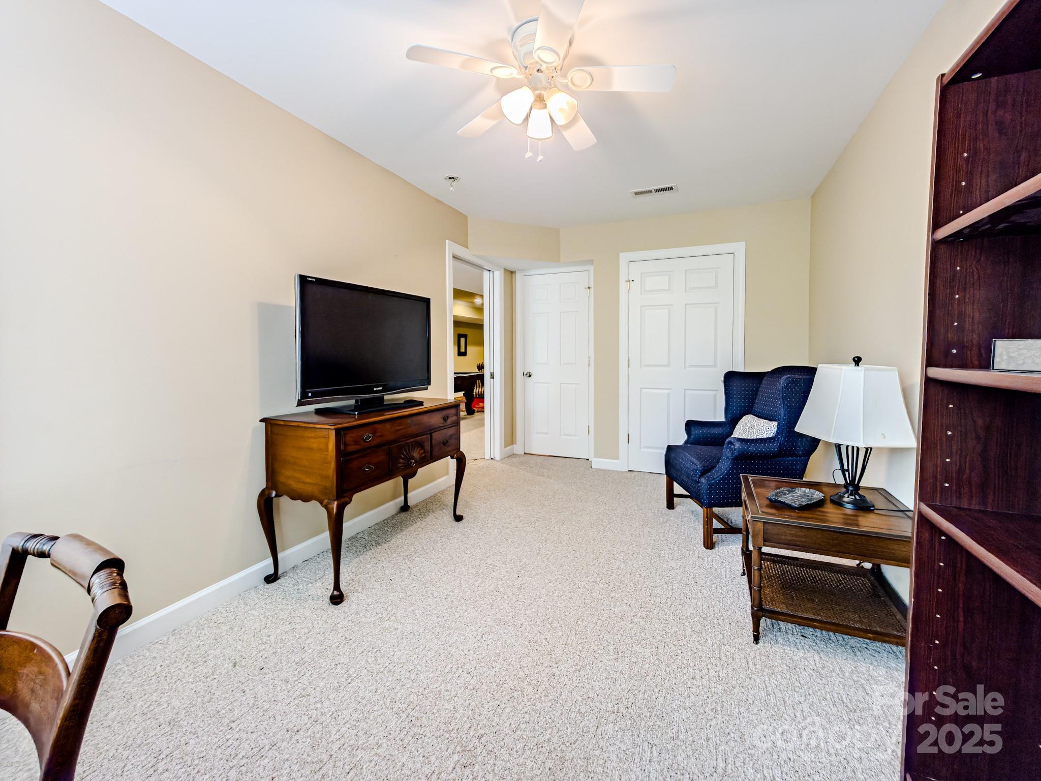196 Col Hamptons Court Rutherfordton, NC 28139 - Photo 38 of 47 a living room with furniture and a flat screen tv