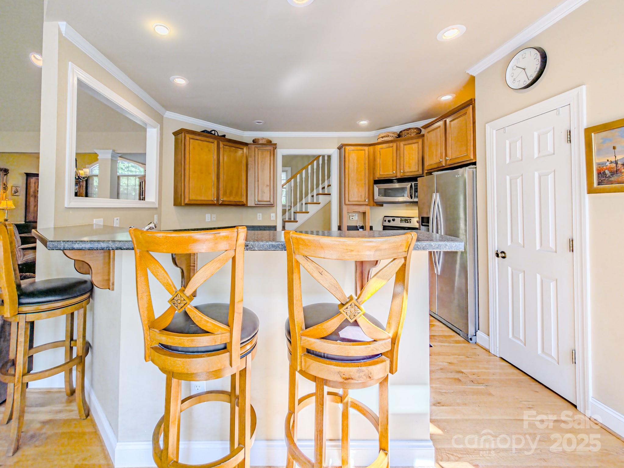 196 Col Hamptons Court Rutherfordton, NC 28139 - Photo 7 of 47 a view of a kitchen area with furniture and wooden floor