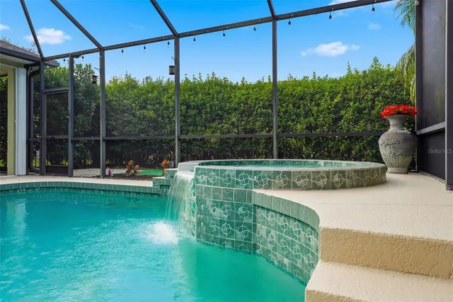 a view of a patio with table and chairs potted plants with wooden fence