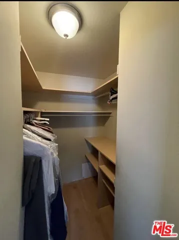 a bathroom with a sink and a shower