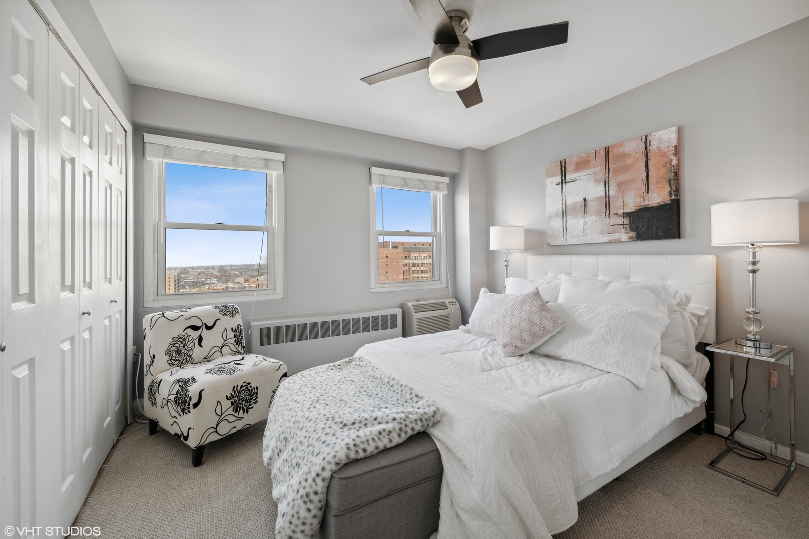 2909 North Sheridan Road, Unit 1711 Chicago, IL 60657 - Photo 8 of 14 a bedroom with a bed and a couch