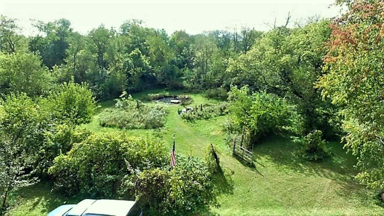 110 Lovesee Road Roscoe, IL 61073 - Photo 3 of 25 a view of a garden
