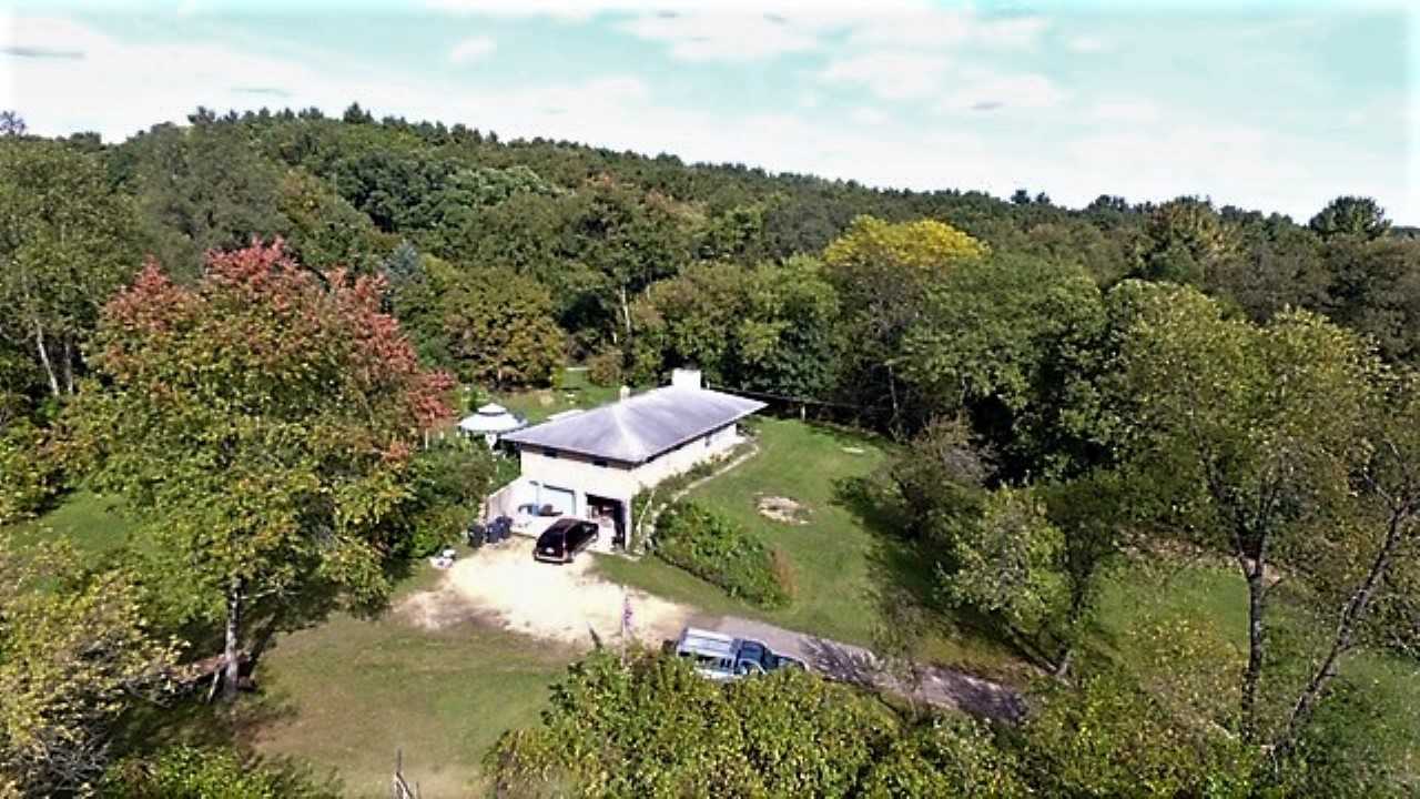 110 Lovesee Road Roscoe, IL 61073 - Photo 6 of 25 a view of a bench in a garden