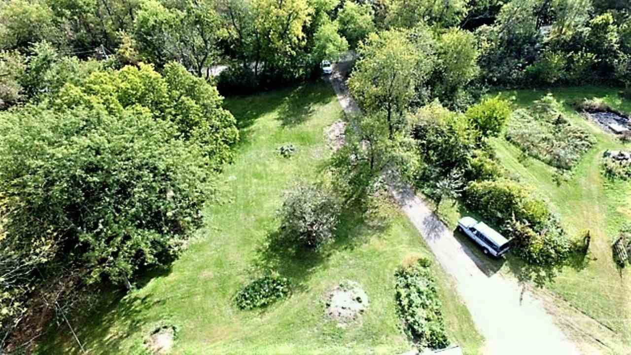 110 Lovesee Road Roscoe, IL 61073 - Photo 8 of 25 a view of a garden