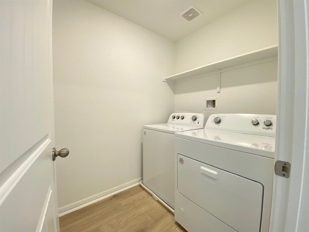 225 Saide Street Georgetown, TX 78626 - Photo 19 of 22 a utility room with dryer and washer