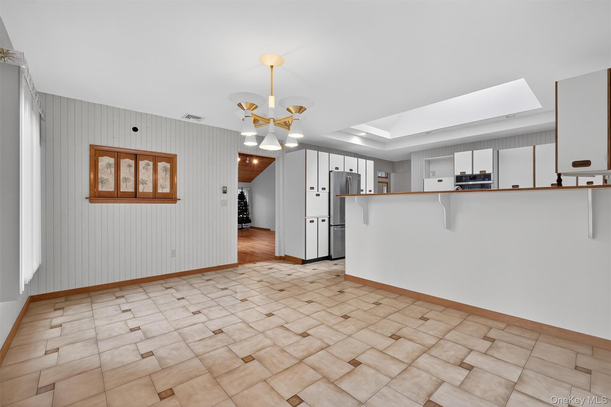 35 Greenlawn Road Amawalk, NY 10501 - Photo 12 of 50 a view of a kitchen with a sink and chandelier