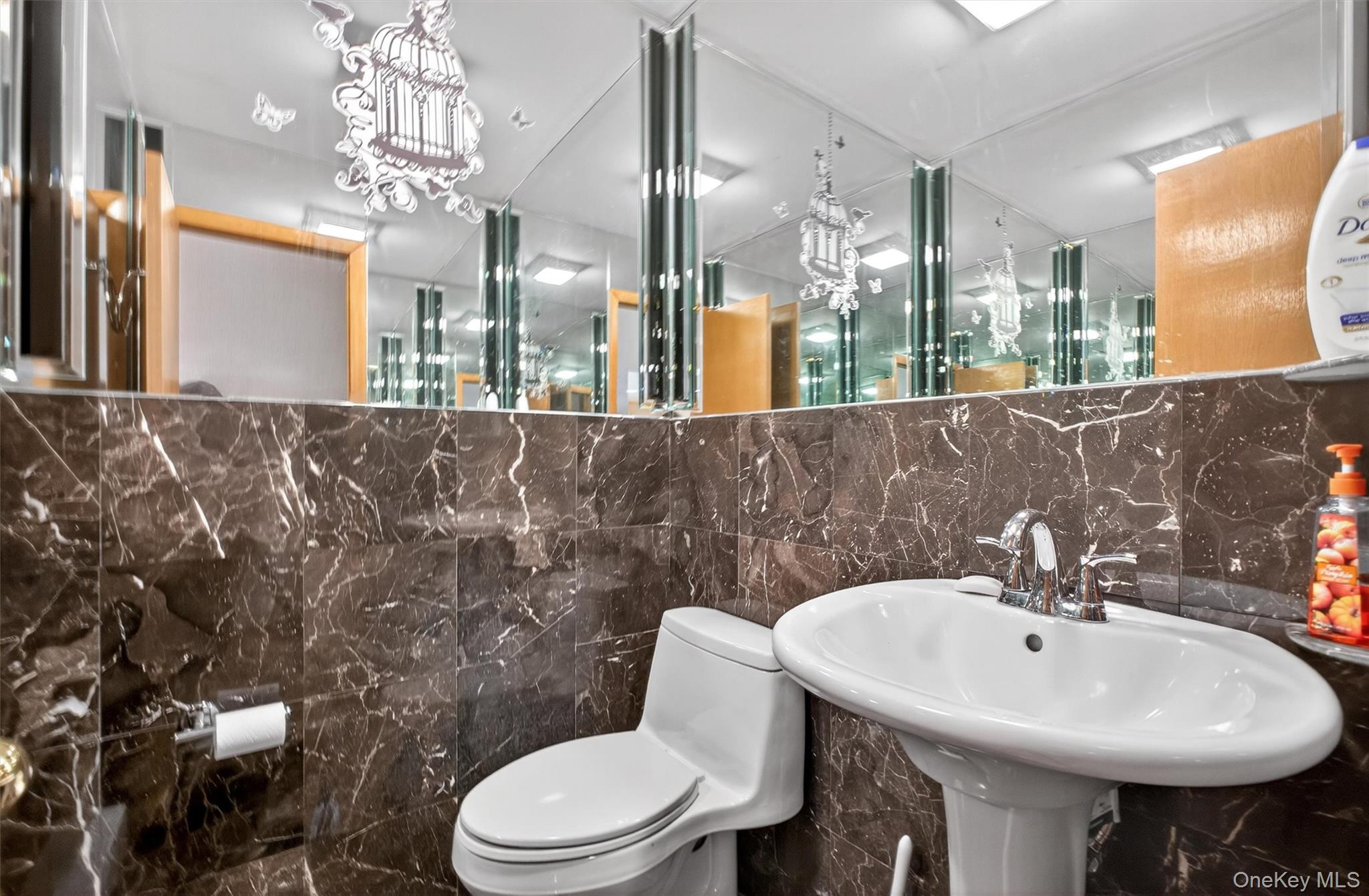 35 Greenlawn Road Amawalk, NY 10501 - Photo 18 of 50 a bathroom with a sink a toilet and mirror