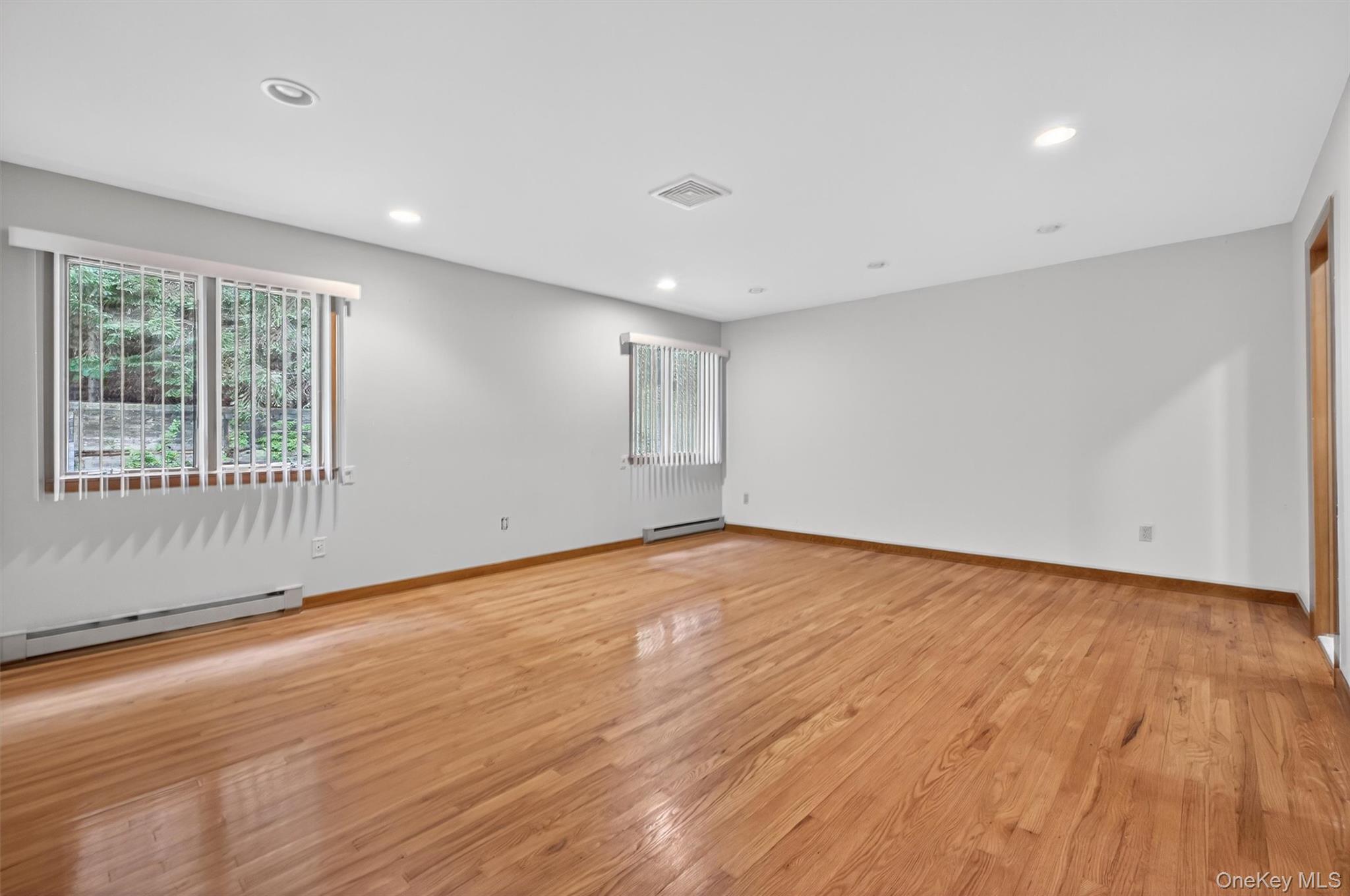 35 Greenlawn Road Amawalk, NY 10501 - Photo 19 of 50 a view of an empty room with wooden floor and a window